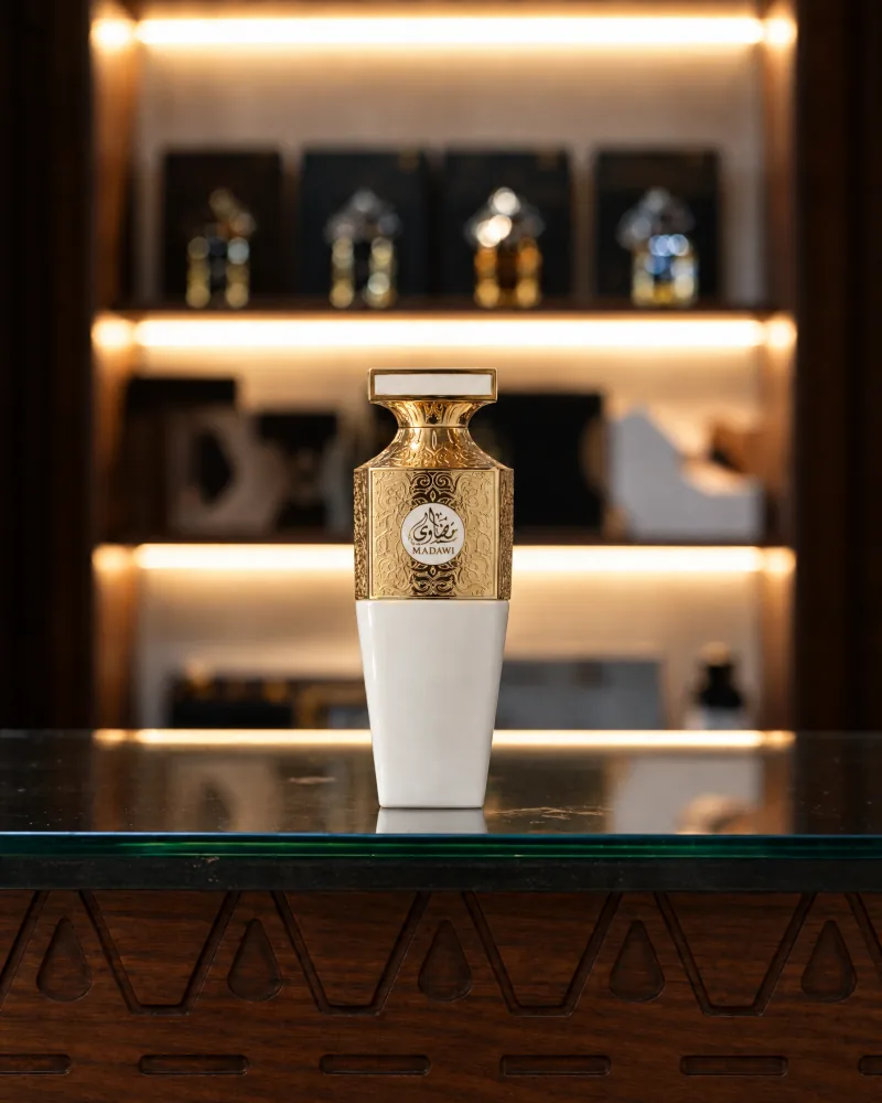 Madawi White on a lit display shelf in the perfume boutique